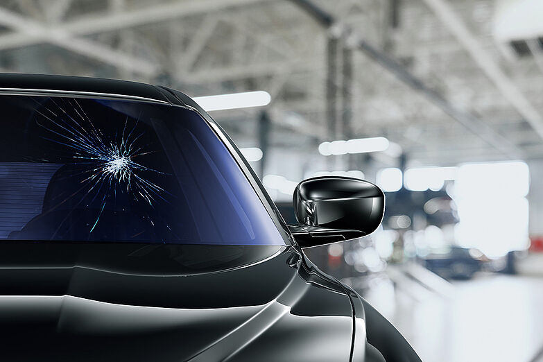 Car windshield with stone chip